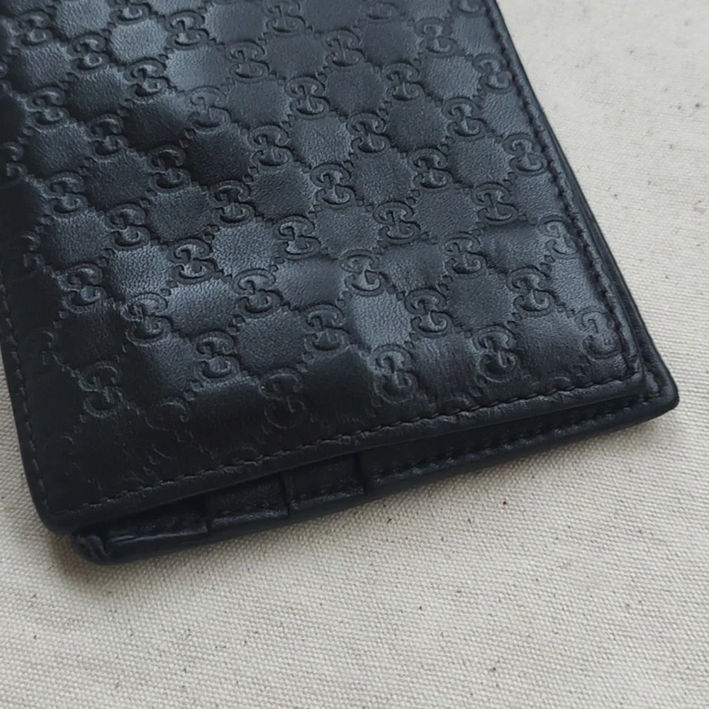 GUCCI Brown Leather MICRO GUCCISSIMA GG embossed Bi-fold wallet USED